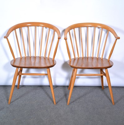 Lot 463 - A pair of Ercol 'Cowhorn' elbow chairs