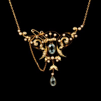 Lot 228 - An Edwardian aquamarine and seed pearl necklace.