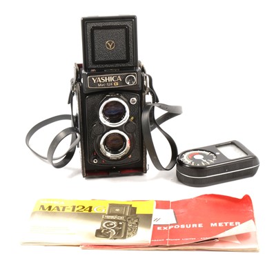 Lot 100 - Yashica 124G twin-lens camera, cased with accessories.