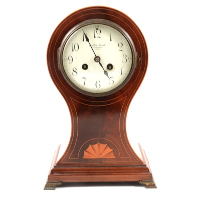 Lot 120 - Edwardian inlaid mahogany balloon cased mantel clock