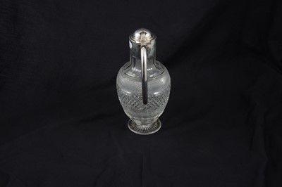 Lot 229 - Silver mounted claret jug