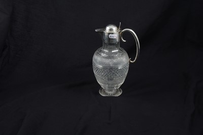 Lot 229 - Silver mounted claret jug