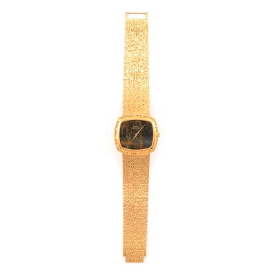 Lot 300 - Piaget - a gentleman's 18 carat yellow gold wristwatch with tiger's eye dial.