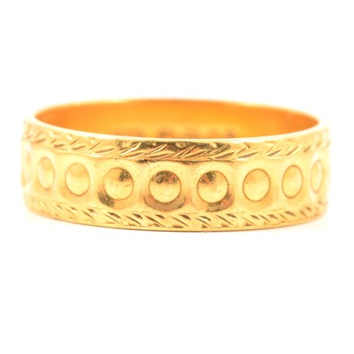 Lot 120 - A 22 carat yellow gold wedding band.