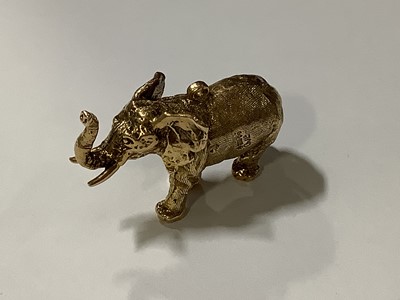 Lot 179 - A 9 carat yellow gold elephant charm.