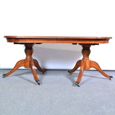 Lot 379 - Reproduction mahogany extending dining table,...