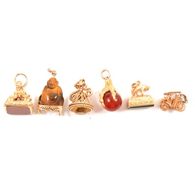 Lot 180 - Five modern 9 carat gold seal type charms and one other.