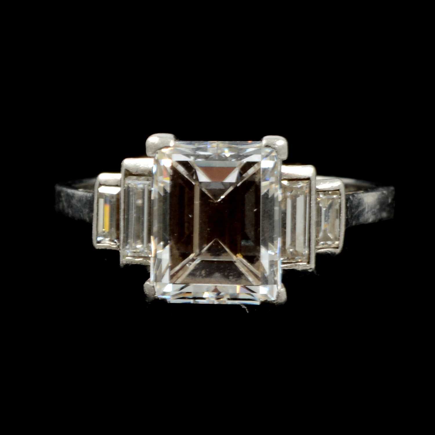14 - A diamond solitaire ring, rectangular step cut stone, 2.38 carats. 