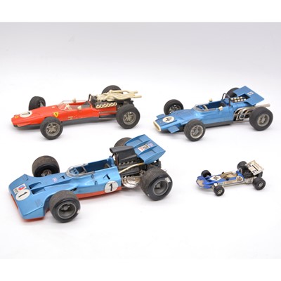 Lot 1022 - Four Schuco and Corgi Toys die-cast model racing cars