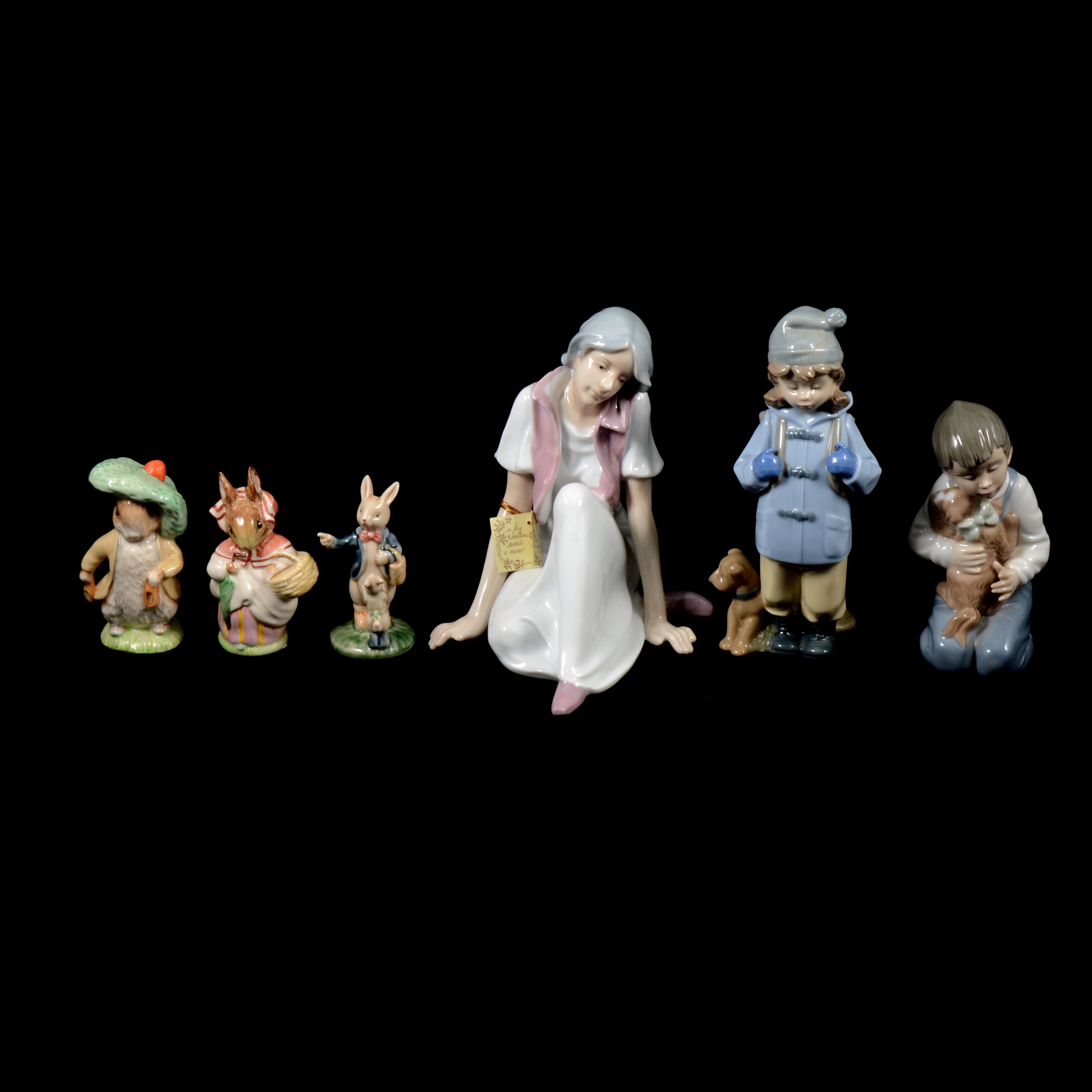 Lot 85 Five Lladro figurines, three Nao, and other