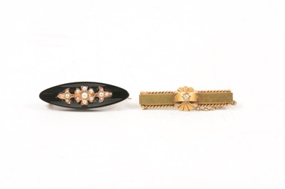 Lot 209 - Two 19th century bar brooches.