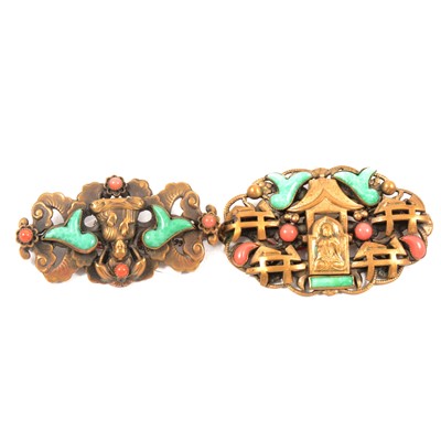 Lot 446 - Two brooches influenced by The Chinese Art Exhibition of 1935-1936, , probably Max Neiger of Goblonz .