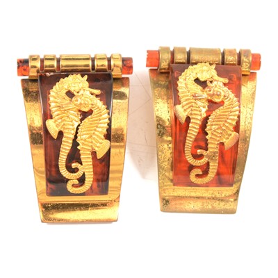 Lot 461 - Nine 1930s Art Deco Hippocampe dress clips retailed by JHP of Paris.