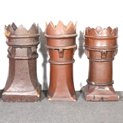 Lot 455 - Two treacle glazed stoneware chimney pots,...