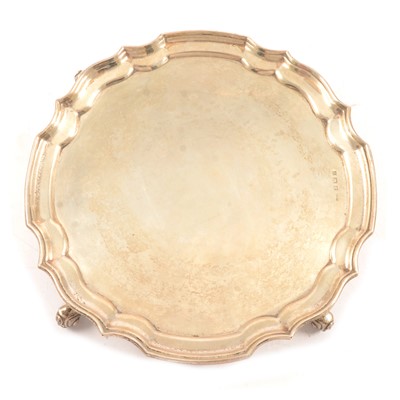 Lot 266 - A silver Chippendle style salver.