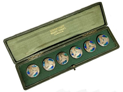 Lot 429 - Liberty and Co. a set of Arts and Crafts silver and enamelled buttons.