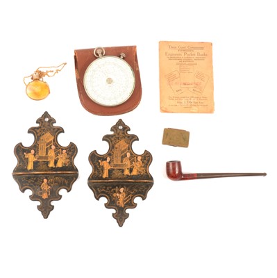 Lot 145 - A pair of chinoiserie papier mache wall bracket pipe holders, stamp case, calculator, pipe, perfume bottle.