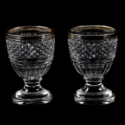 Lot 269 - A pair of George III oval glass hobnail design vases with silver rims by Paul Storr.