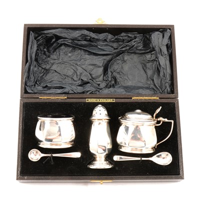 Lot 423 - A three-piece silver cruet set, Barker Brothers Silver Ltd, Birmingham 1956.