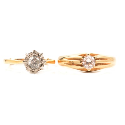 Lot 116 - Two gold rings set with synthetic white stones.