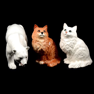 Lot 104 - Two Beswick seated cats, and a Charism Pottery Polar Bear