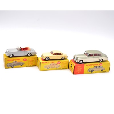 Lot 1063 - Three Dinky Toys die-cast models including ref 195 Jaguar 3.4 Saloon etc