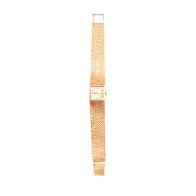 Lot 342 - Certina - a lady's 9 carat yellow gold bracelet watch.