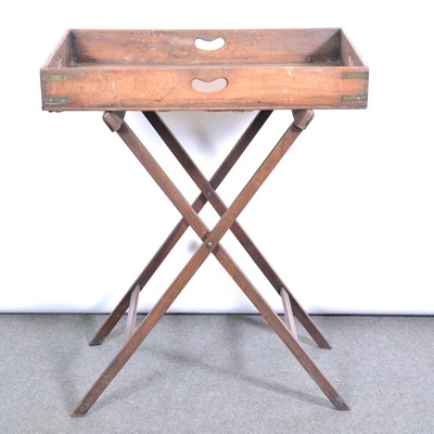 Lot 433 - Victorian mahogany butler's tray on a folding stand.