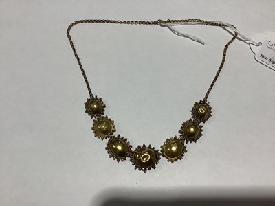 Lot 224 - A foil back amethyst necklace.