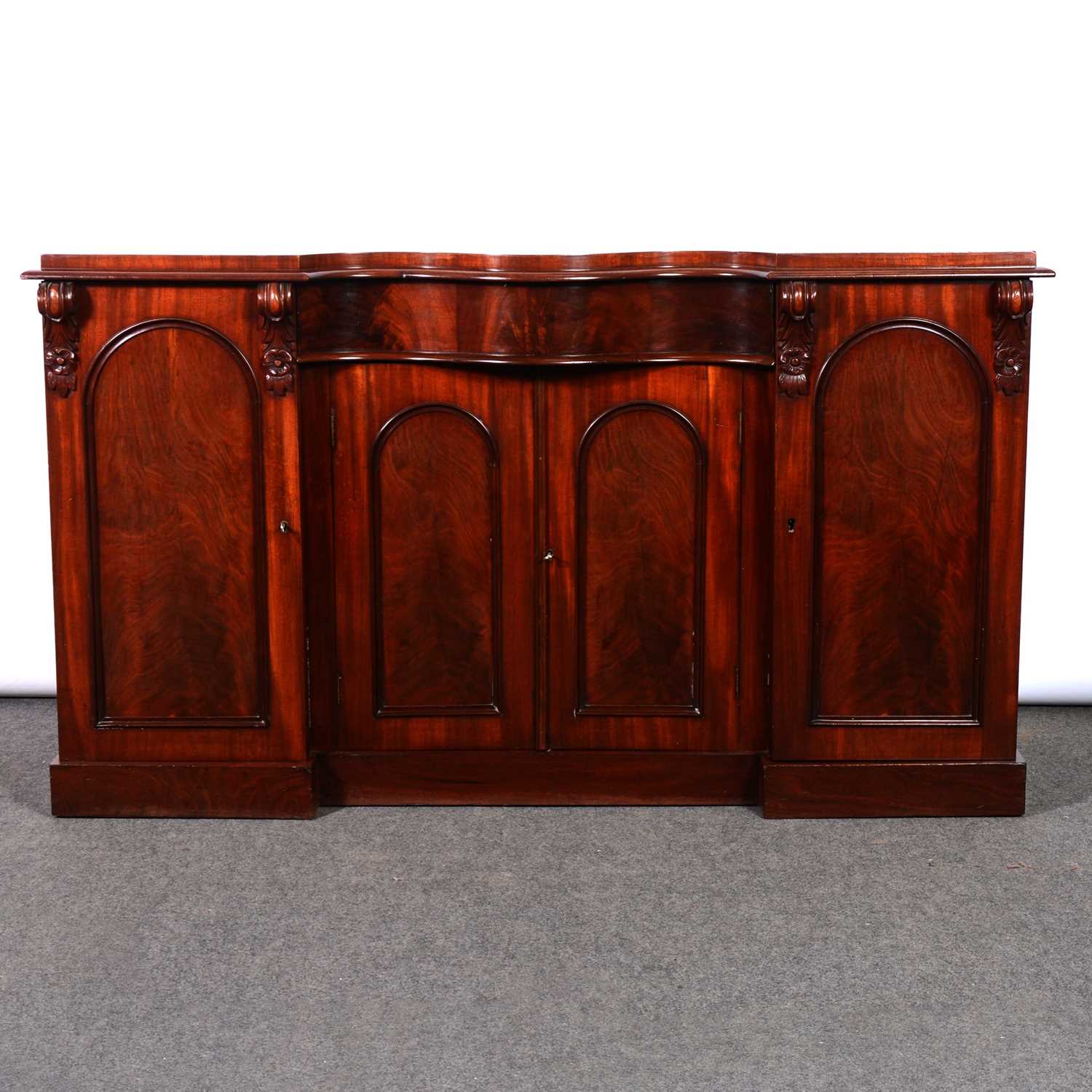 Lot 282 - Victorian mahogany serpentine sideboard