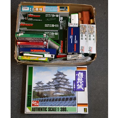 Lot 467 - A collection of Kato, Tomix and other boxed and unboxed model railway buildings and accessories