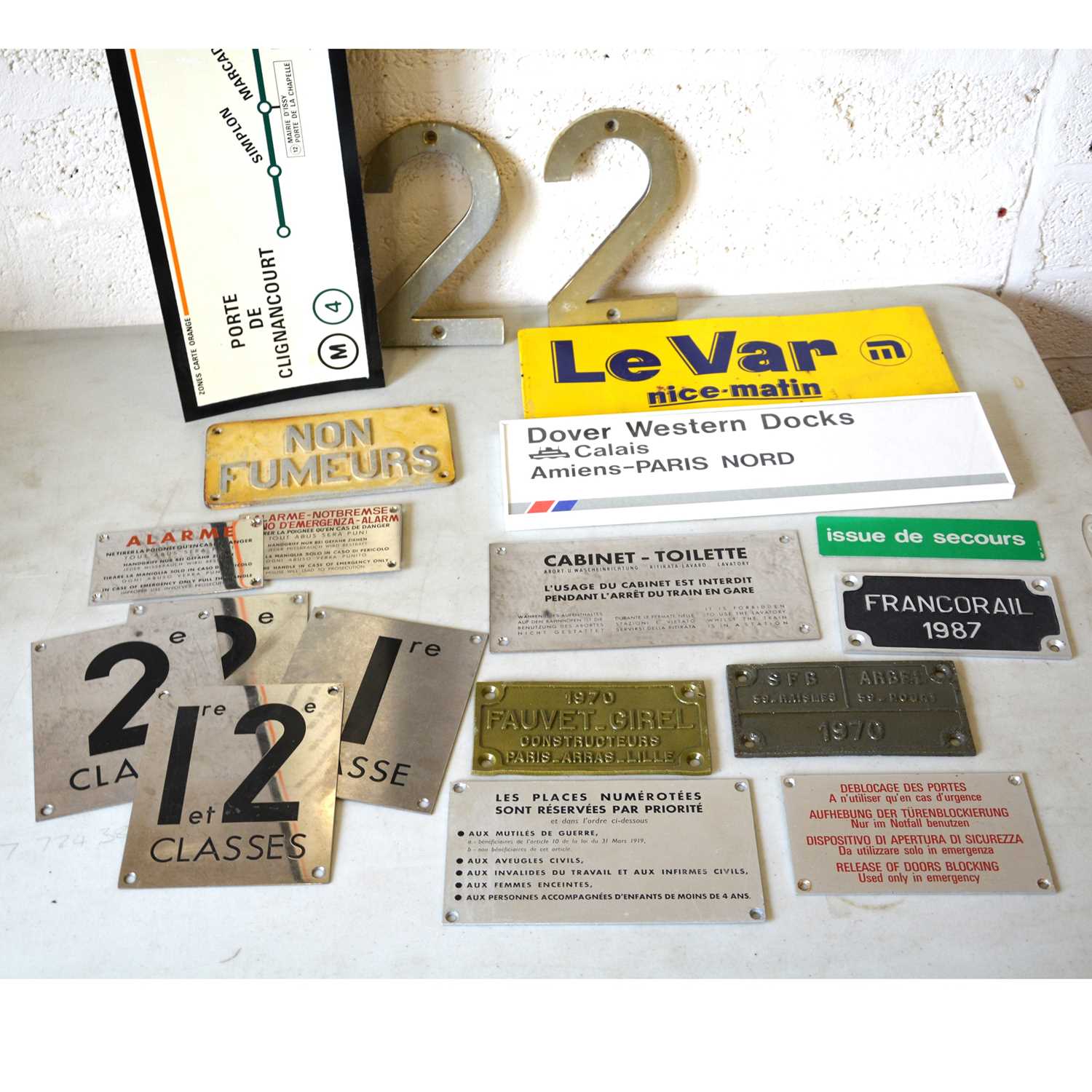 Lot 217 - A collection of French railway plates and signs, and Paris route map