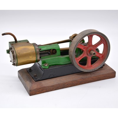 Lot 88 - A well-made horizonal steam mill engine, on wooden base, 3.5inch, length 20cm.