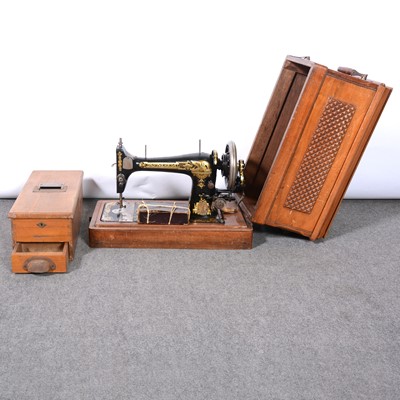 Lot 424 - Oak till drawer and a Singer sewing machine