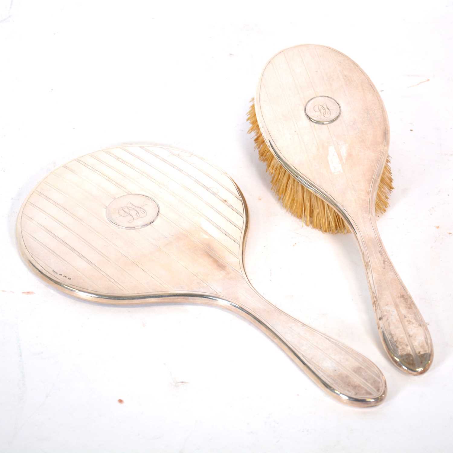 Lot 280 Silverbacked hand mirror and hairbrush,