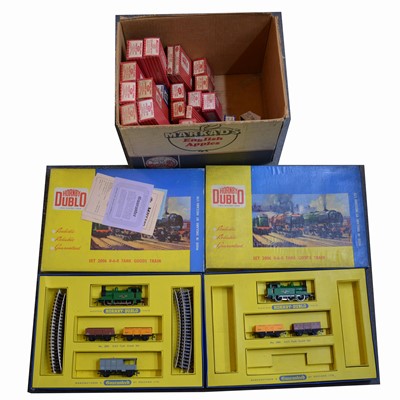 Lot 309 - Two Hornby-Dublo OO gauge model railway sets; twenty-three Hornby-Dublo cars and accessories