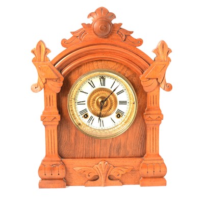 Lot 150 - An Ansonia oak cased mantel clock, with strike.