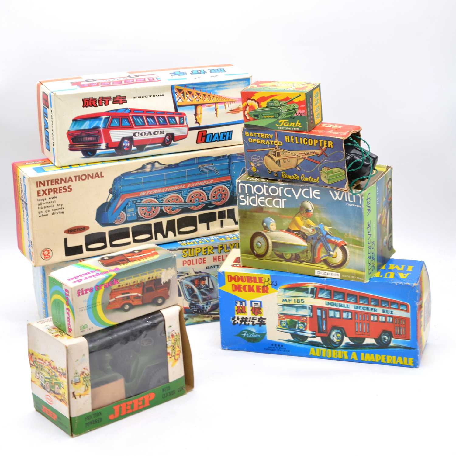 Lot 1043 - Nine Tin-plate toys and models including TPS, Japan, Super Flying Police Helicopter