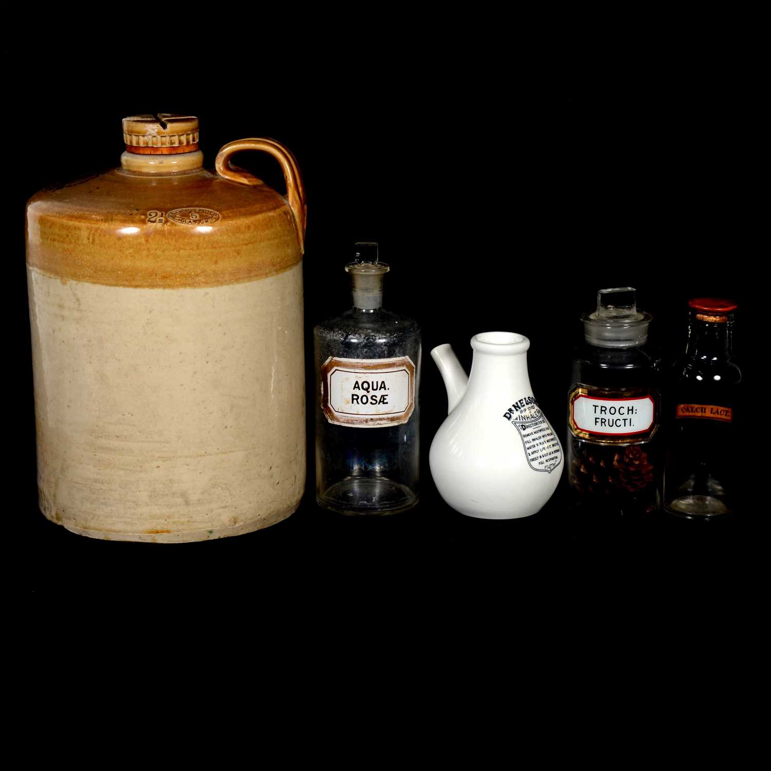 Lot 61 - A collection of glass and pottery apothecary jars and pots