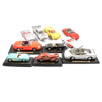 Lot 159 - Burago 1:18 and 1:24 scale model cars, ten unboxed examples.