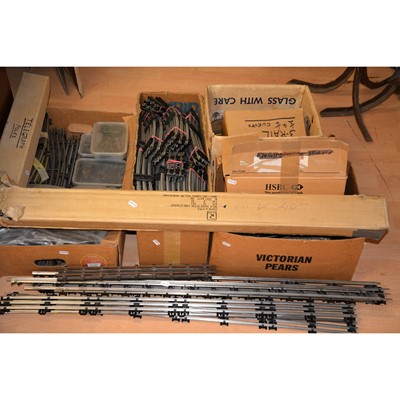 Lot 201 - Four boxes and loose O and OO gauge model railway track and telegraph poles.