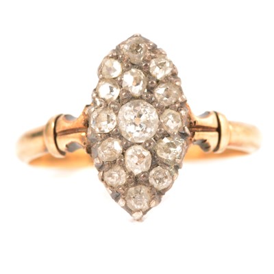 Lot 221 - A marquise diamond cluster ring.