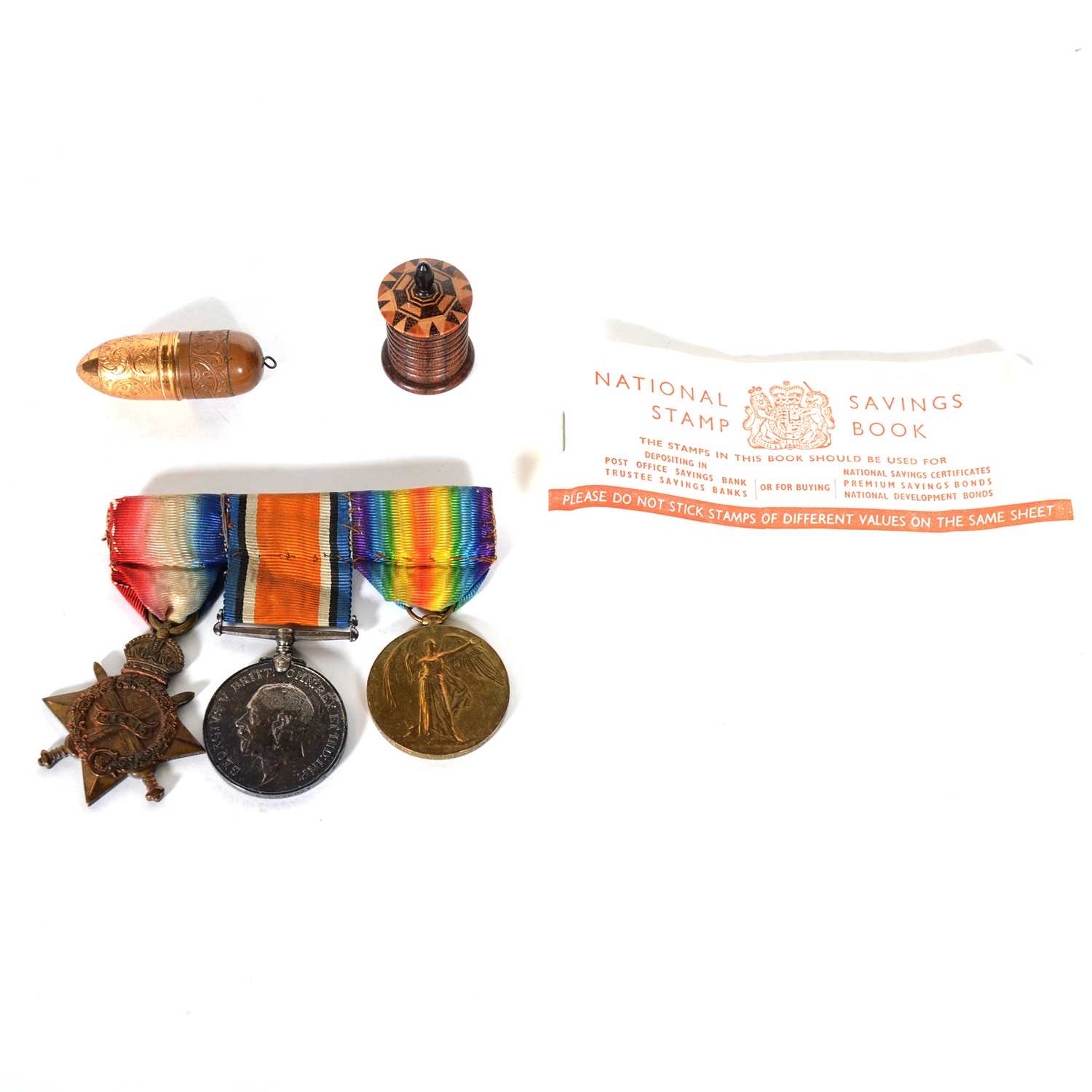 Lot 167 - Three WWI medals, Tunbridgewae tape and gilt metal thimble holder.
