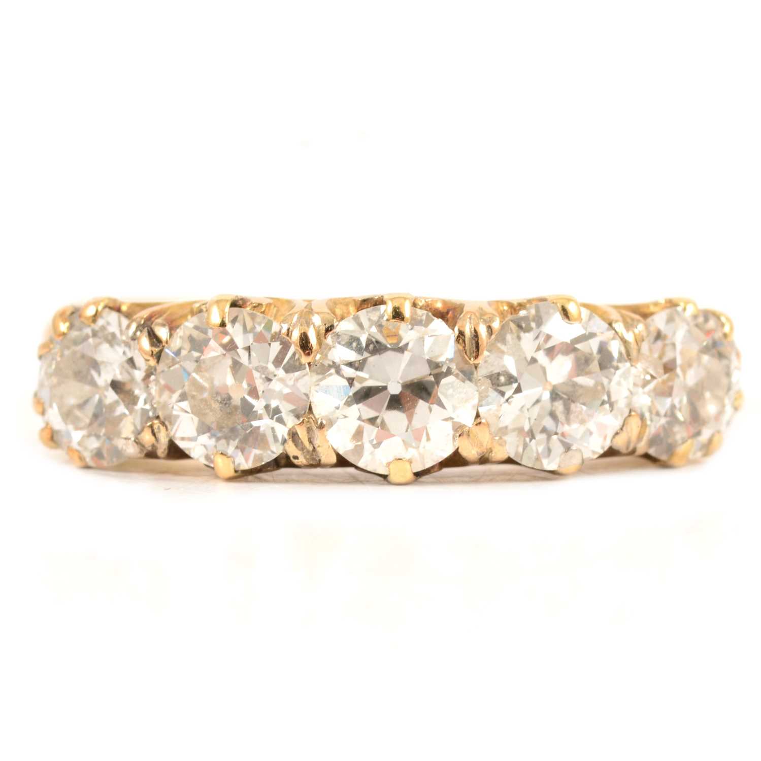 Lot 21 - A Diamond Five Stone Half Hoop Ring.