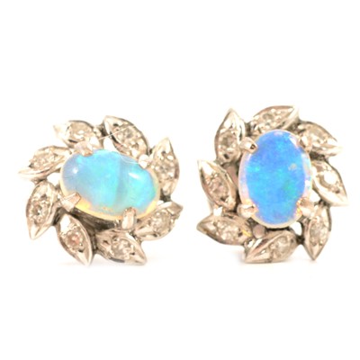 Lot 87 - A pair of opal and diamond cluster earrings.