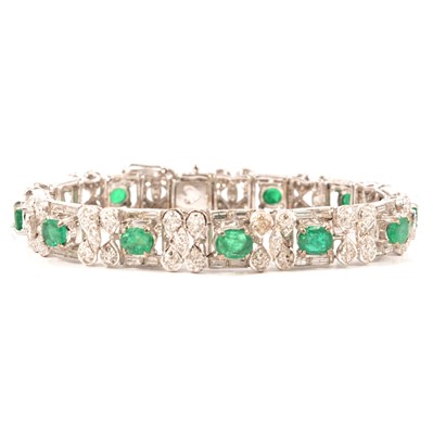 Lot 203 - An emerald and diamond bracelet.