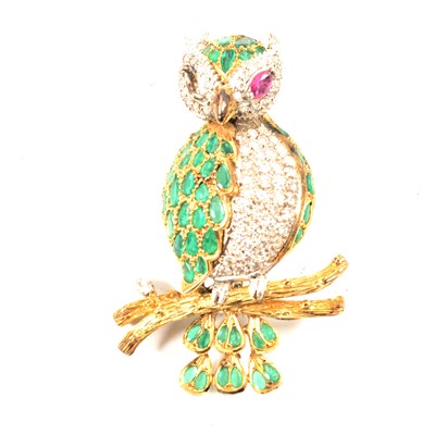 Lot 260 - A diamond, emerald and ruby owl brooch