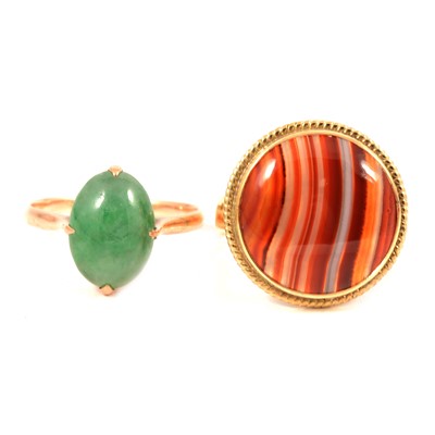Lot 112 - A banded agate ring and jade coloured ring.