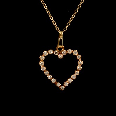Lot 233 - A diamond heart pendant and chain.