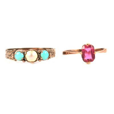 Lot 257 - A turquoise and pearl three stone ring, and a pink paste solitaire ring.